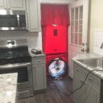 Blower door setup to measure air leakage